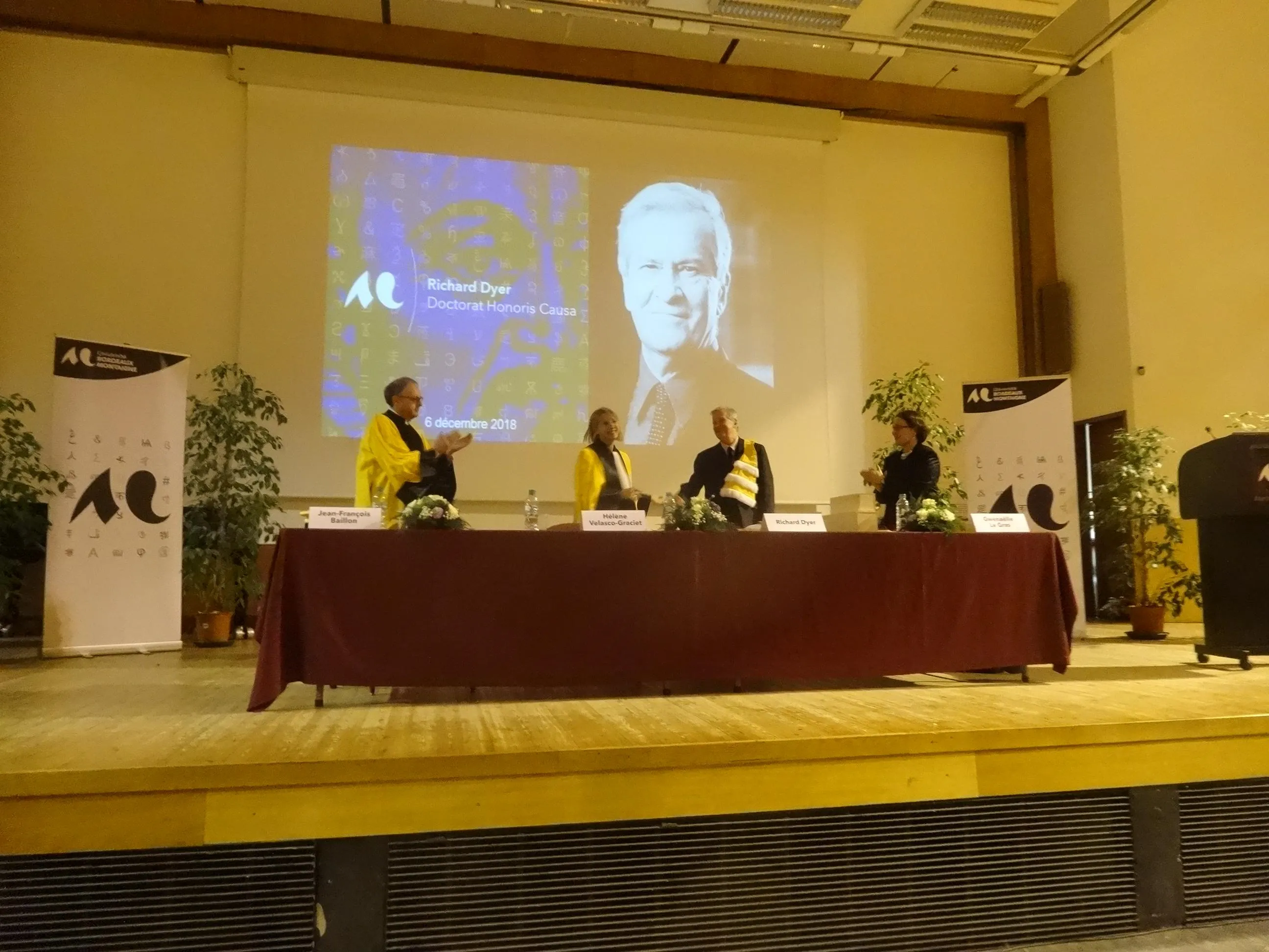 Richard Dyer (second from right) shakes hands at the end of the ceremony with Hélène Velasco-Graciet, President of the Université Bordeaux Montaigne