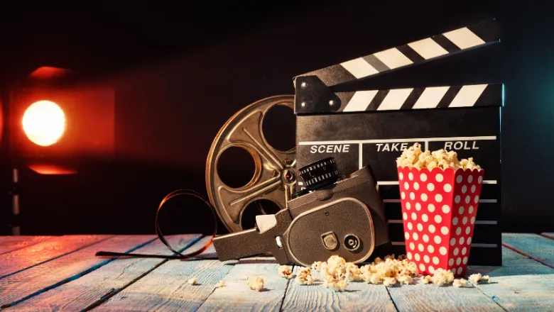 Photo of camera reel and popcorn 