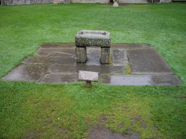 The image shows a replica of the Stone of Scone.