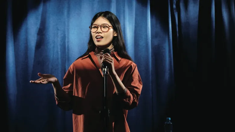 Woman doing stand-up comedy