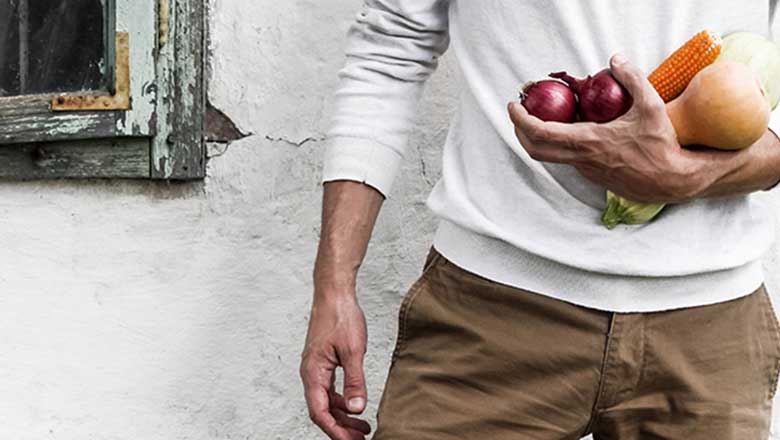 Man holding vegetables