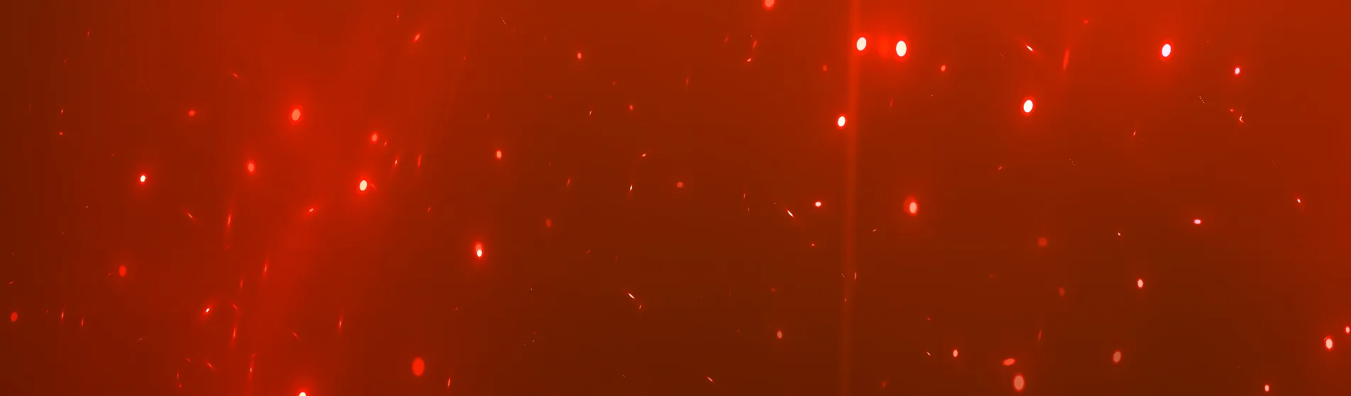 Header image with red and white sparkling lights
