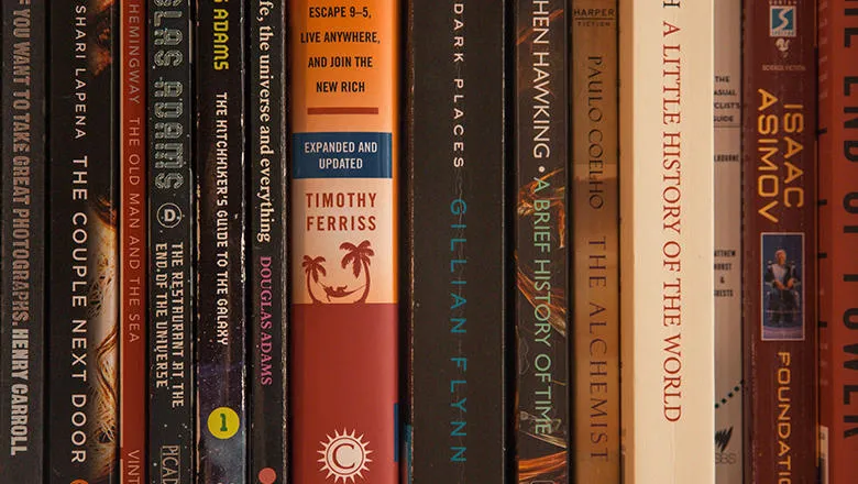 A row of books on a bookshelf.