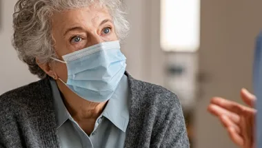 elderly lady wearing mask covid csi 1903x558