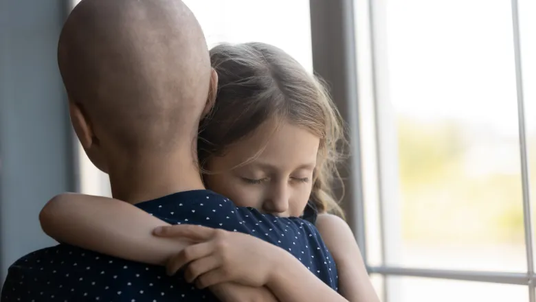 girl hugging family member