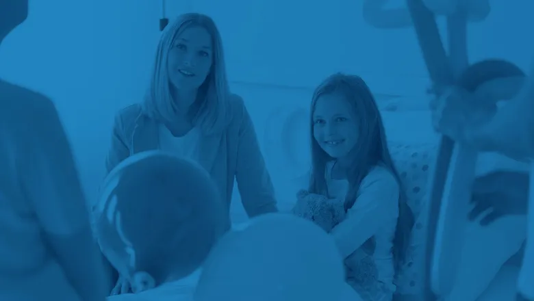 girl with family childrens hospital balloons csi  780x450
