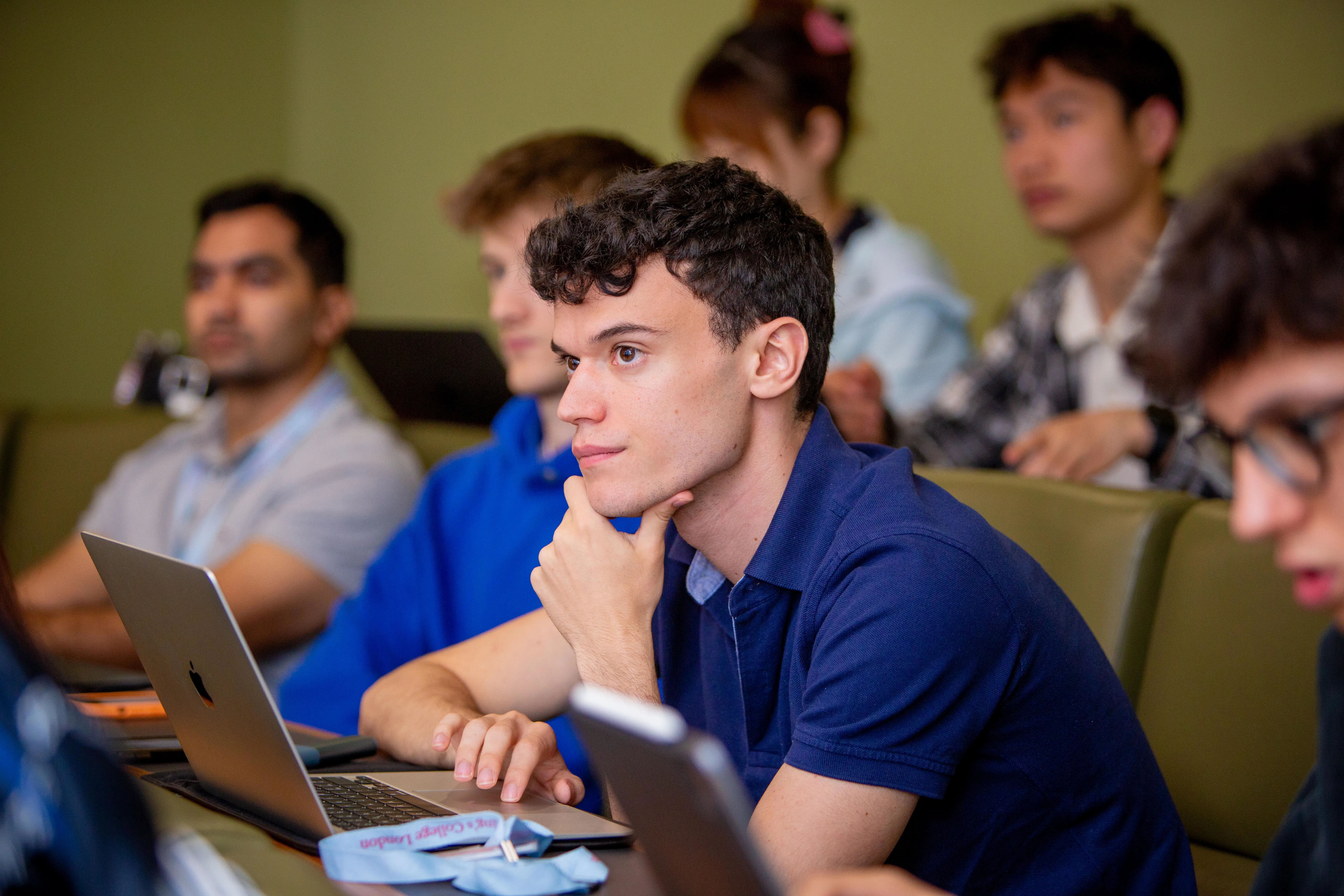 A student in a lecture theatre at a King's summer school.