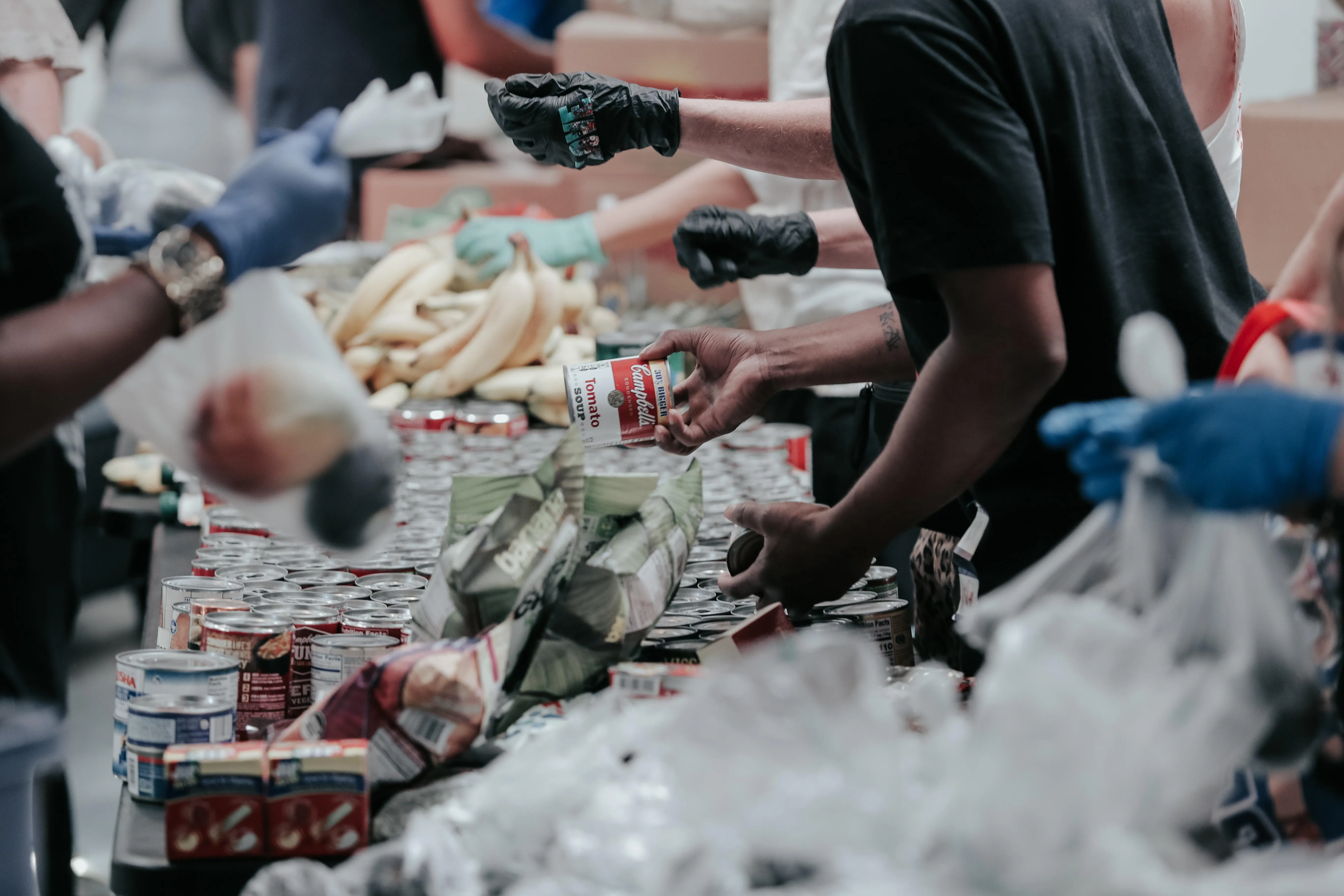 People wear gloves in food market