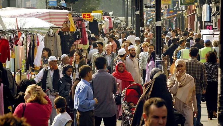 A crowd of people in a London market