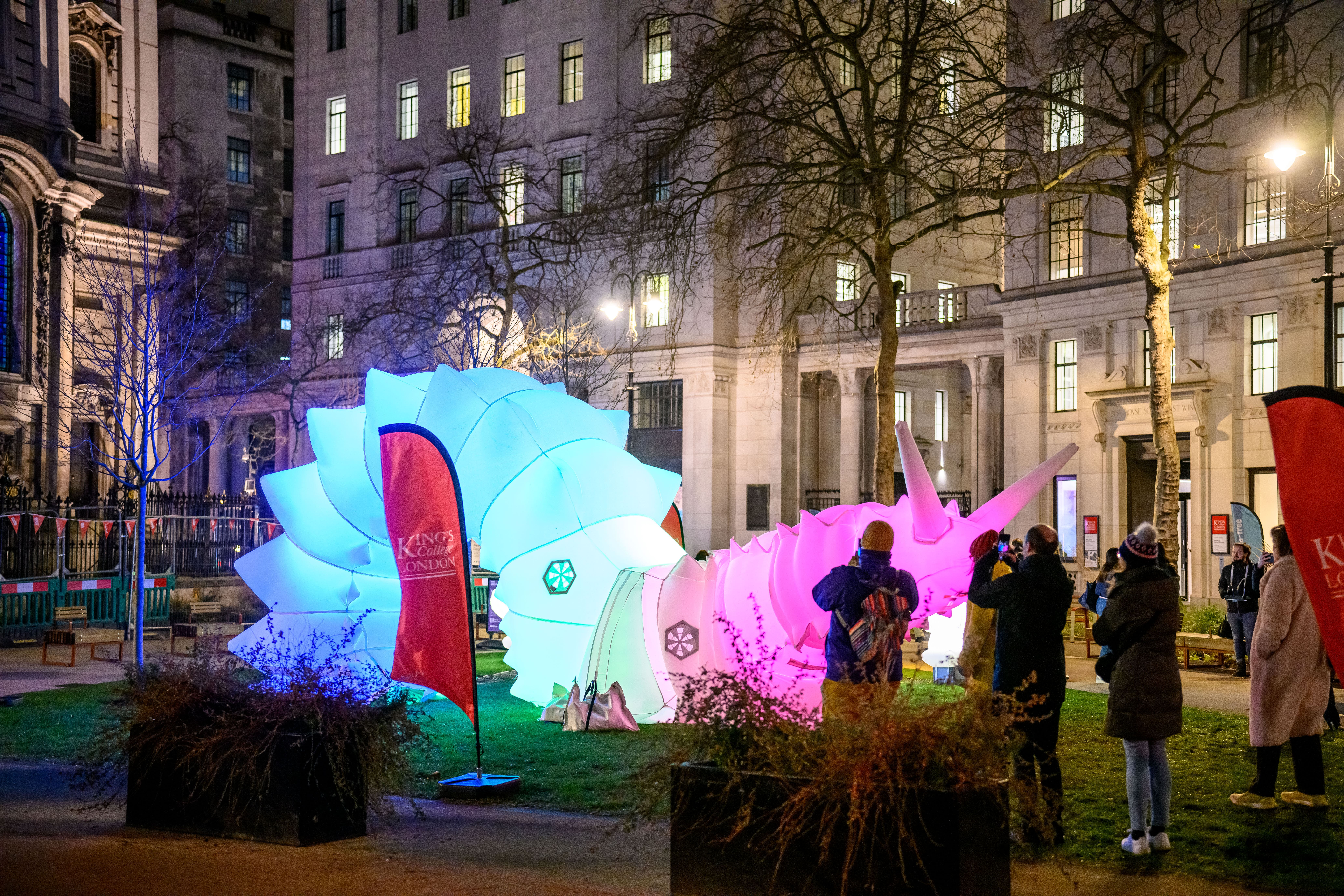 A giant blow-up caterpillar with coloured lights inside at the King's Strand Campus.