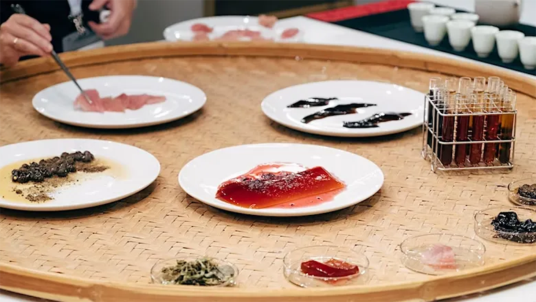 different plates of food on a round table