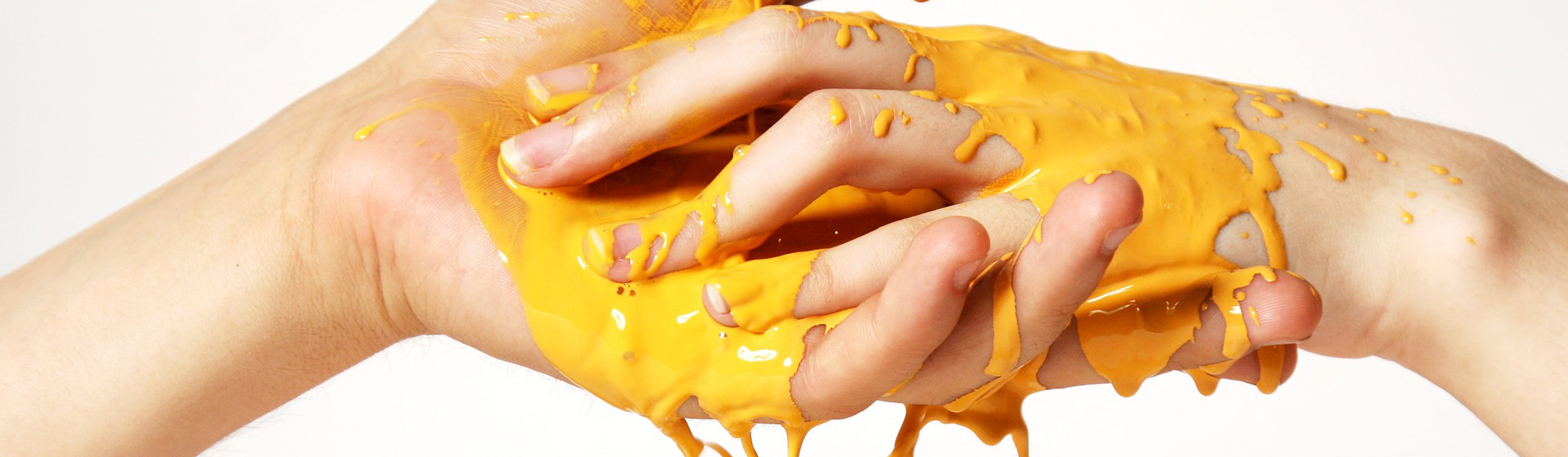 hands-yellowpaint_685x200px