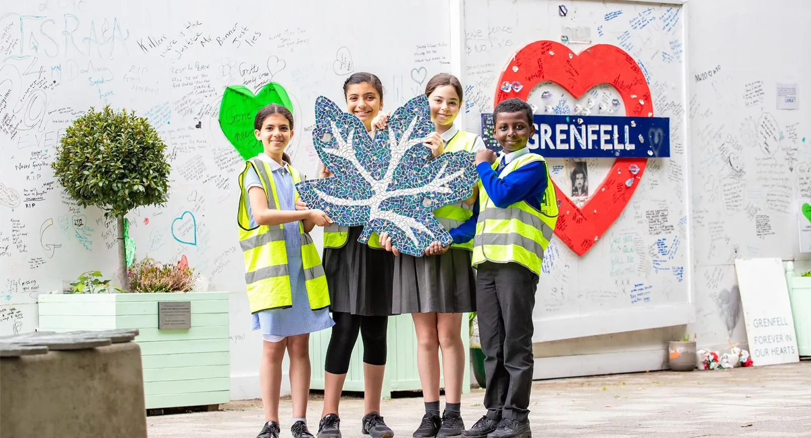 ACAVA: Installation of mosaic leaf co-created with a local school as part of phase two of the Grenfell Memorial Community Mosaic project in North Kensington (London). Photo by Jason Garcia.