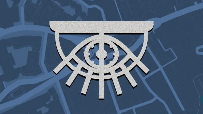 Grey logo sign resembling an eye over a blue map of the Strand