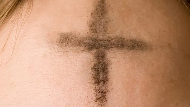 Mark of the cross in ashes on a forehead