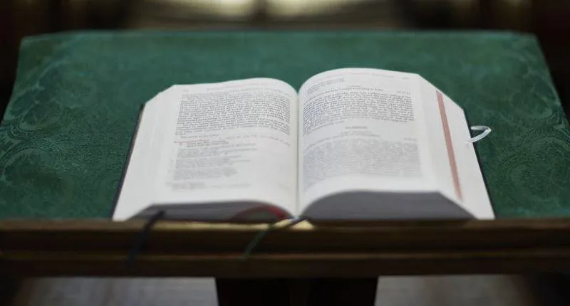 Open Bible on Pedestal