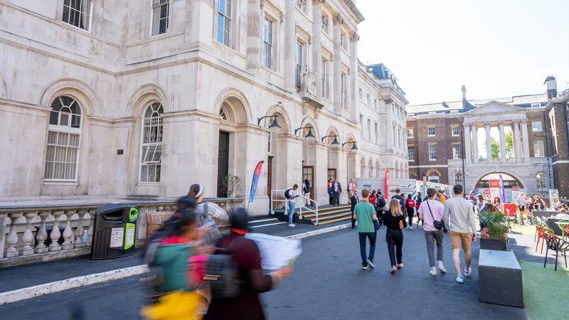 People walking down Strand campus on an Open day.