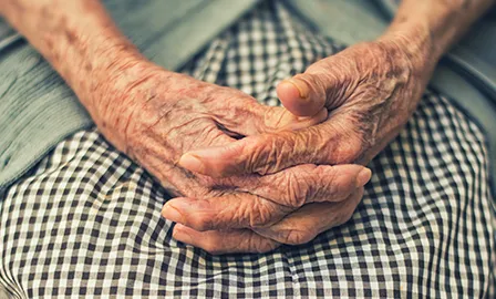 Close-up of the hands of an elder person