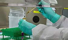 Scientist with test tube