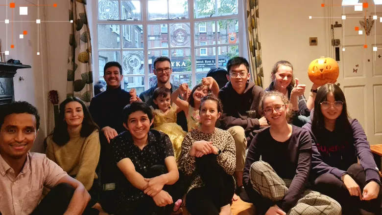 Group of people sitting together and smiling