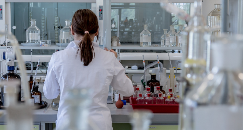 Back of student working in a lab