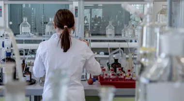 Back of student working in a lab