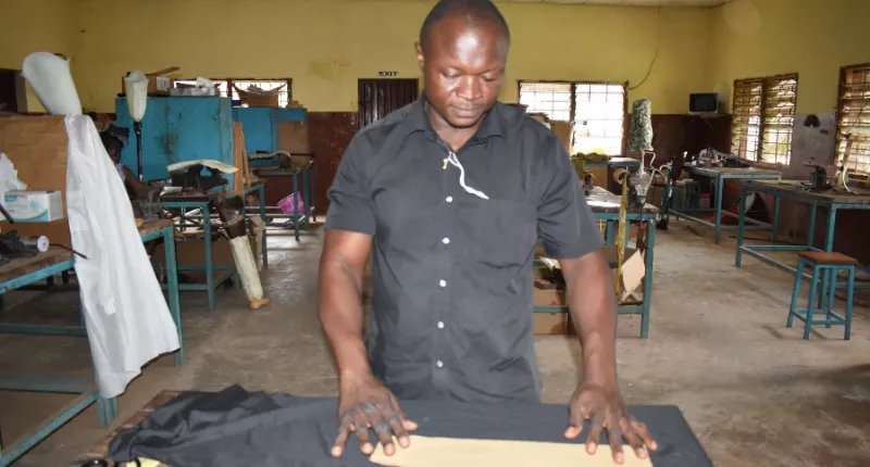 pressure garment technician in his workshop Sierra Leone