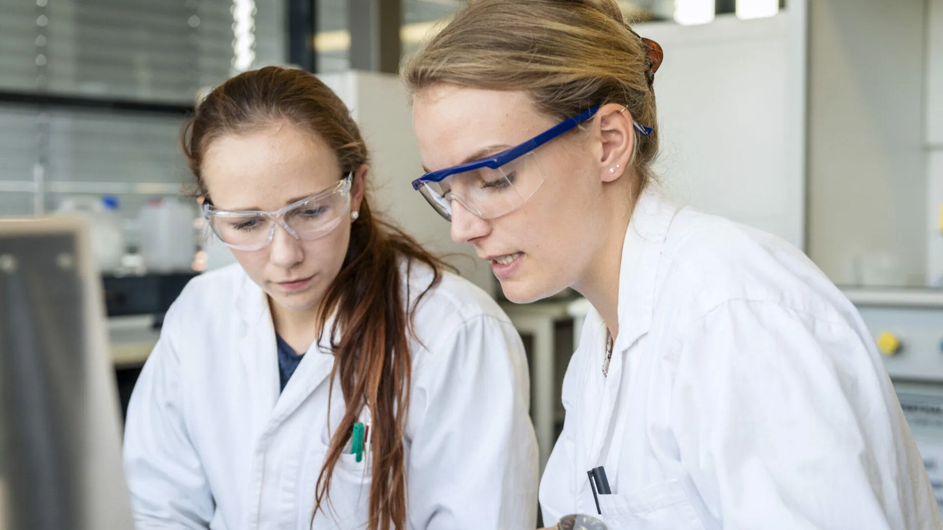 a TransCampus medical student in a laboratory with a lecturer.