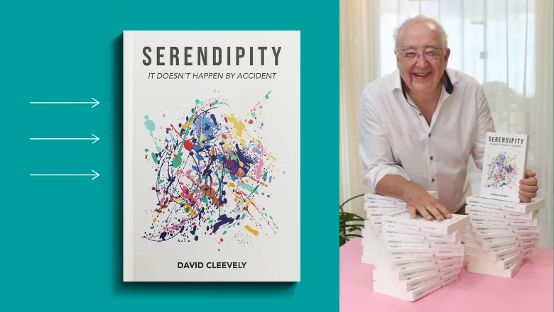 Dr David with copies of the book