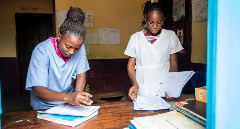Health workers complete patient log books DRC