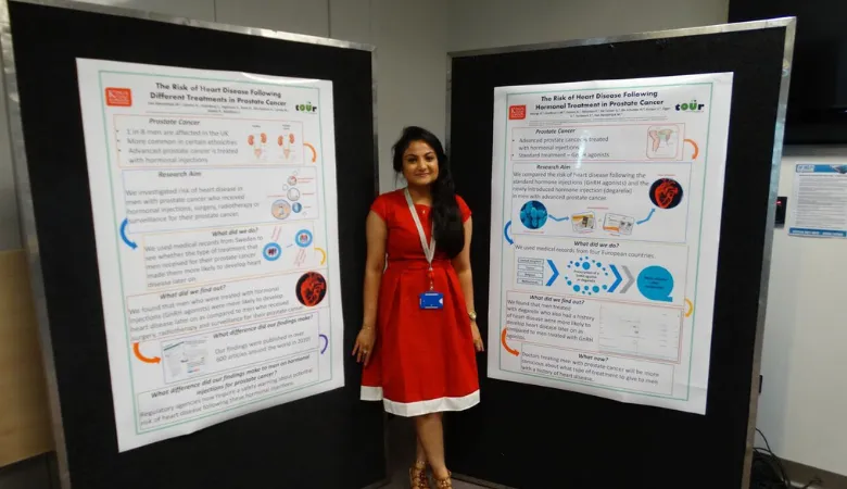 Student and posters at Facts and Snacks event