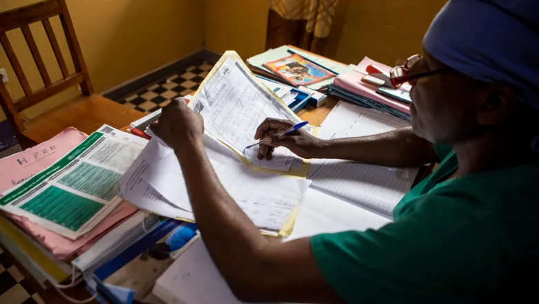 Health worker with medical records DRC