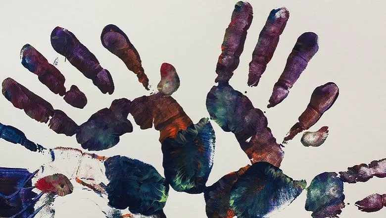 colourful handprint on paper depicting art therapy