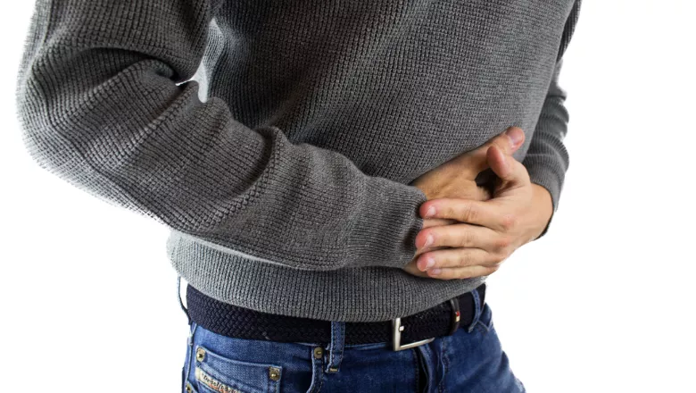 Man suffering from stomach pain