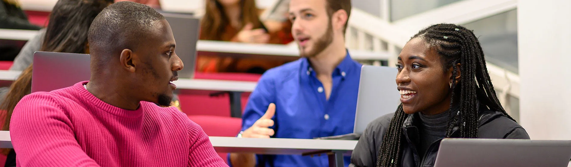 A photograph of students in a lecture theatre.