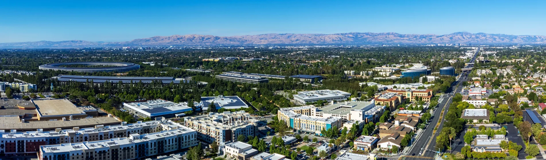 Aerial panoramic view of Cupertino, residential and commercial neighbourhood in San Francisco Bay Area, California