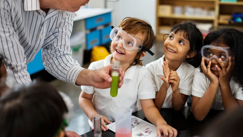 Children doing an experiment in a classroom