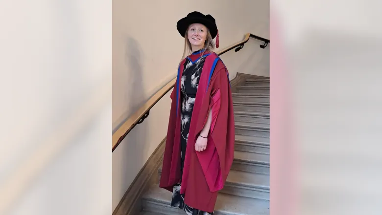 A full length photo of Suzanne Keddie in a ceremonial gown.