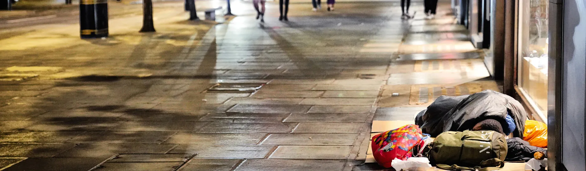 Homeless Individuals Using Duvets And Sleeping Bags Outside John Lewis At Oxford Street Night Street View