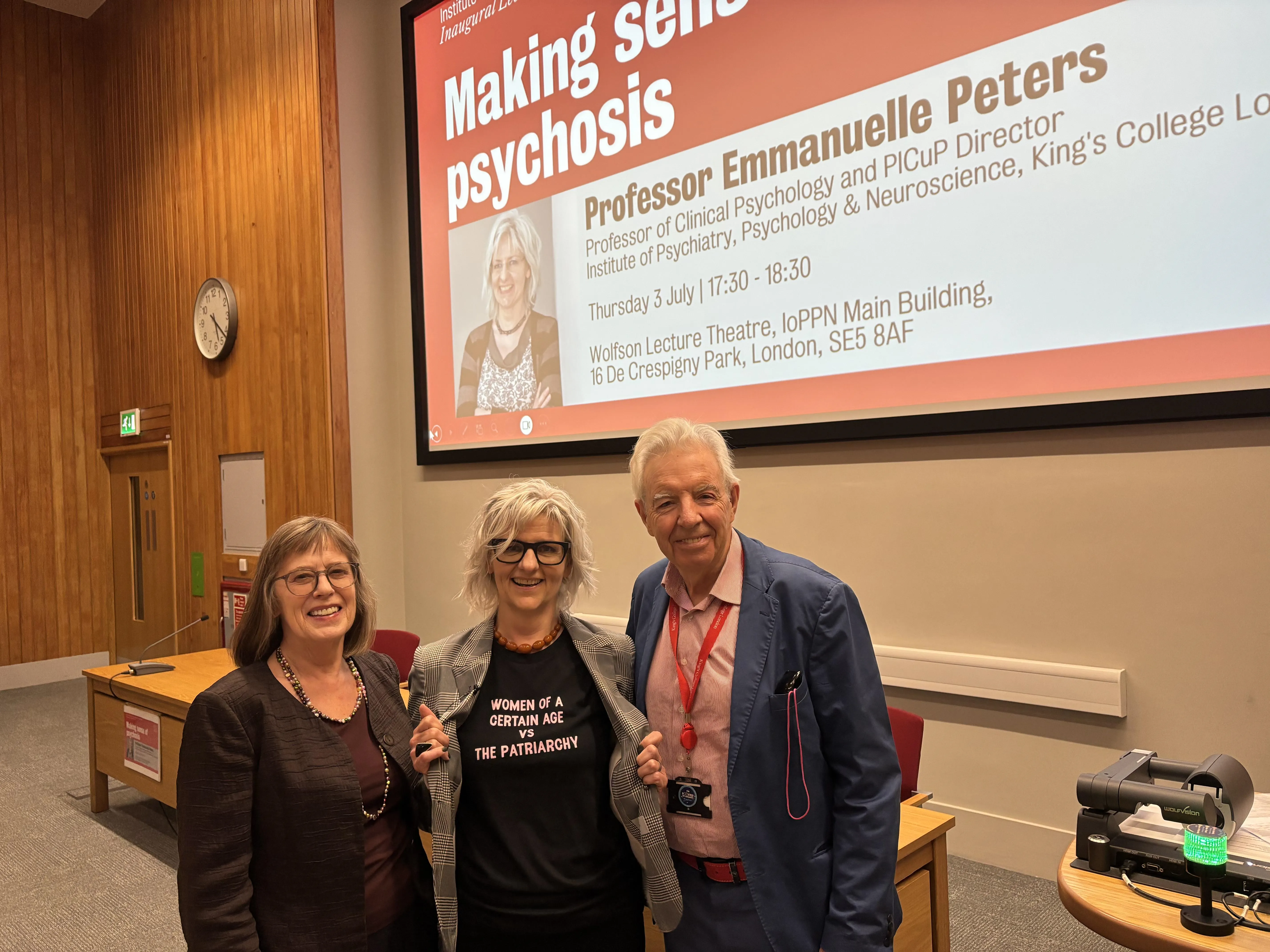 Professors Elizabeth Kuipers, Emmanuelle Peters and Sir Robin Murray at the front of lecture theatre