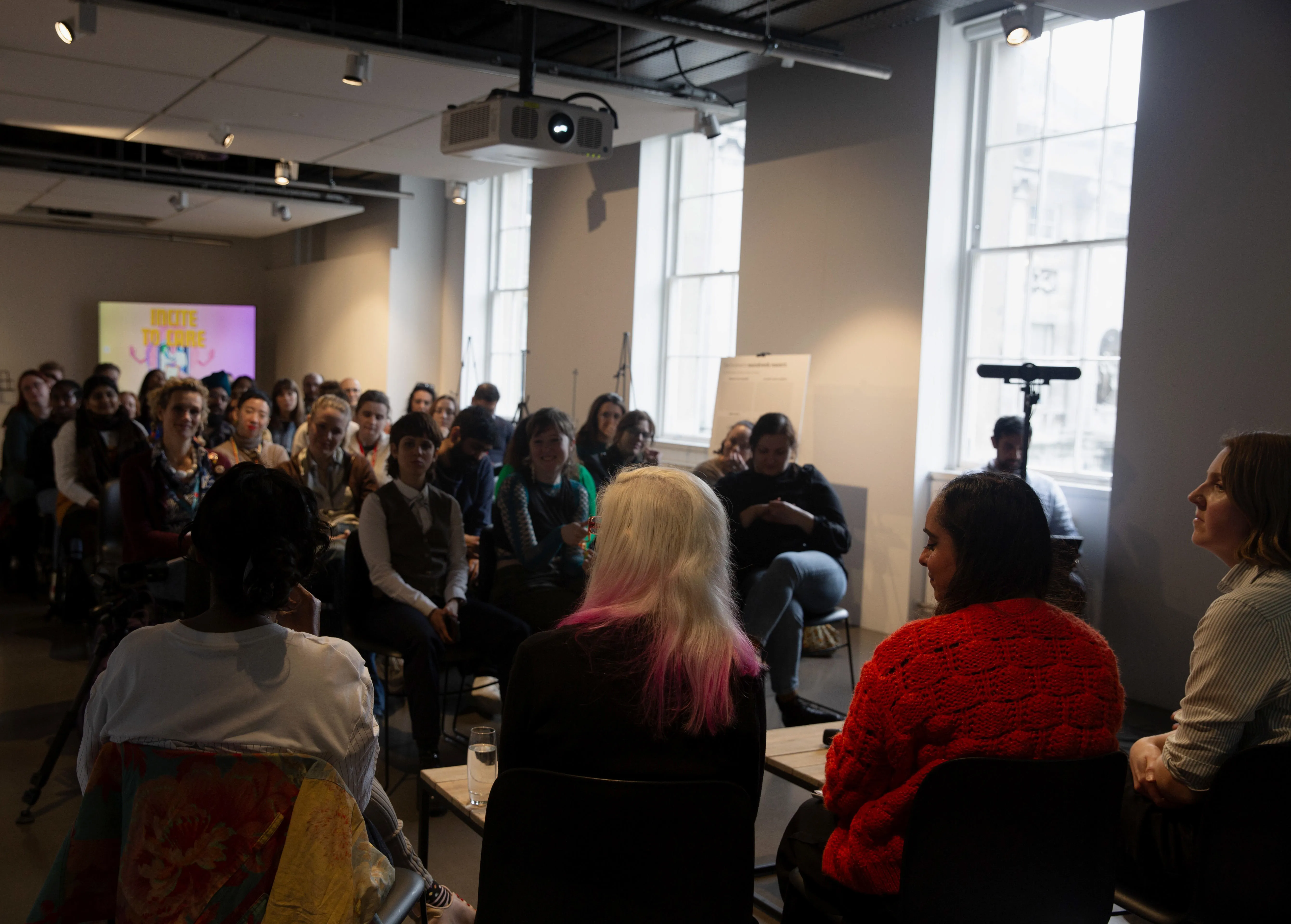 Guests enjoying panel discussion