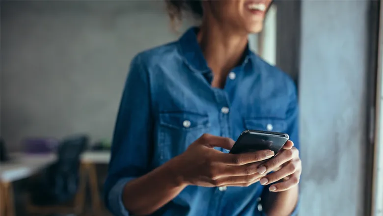 Woman holding a smartphone