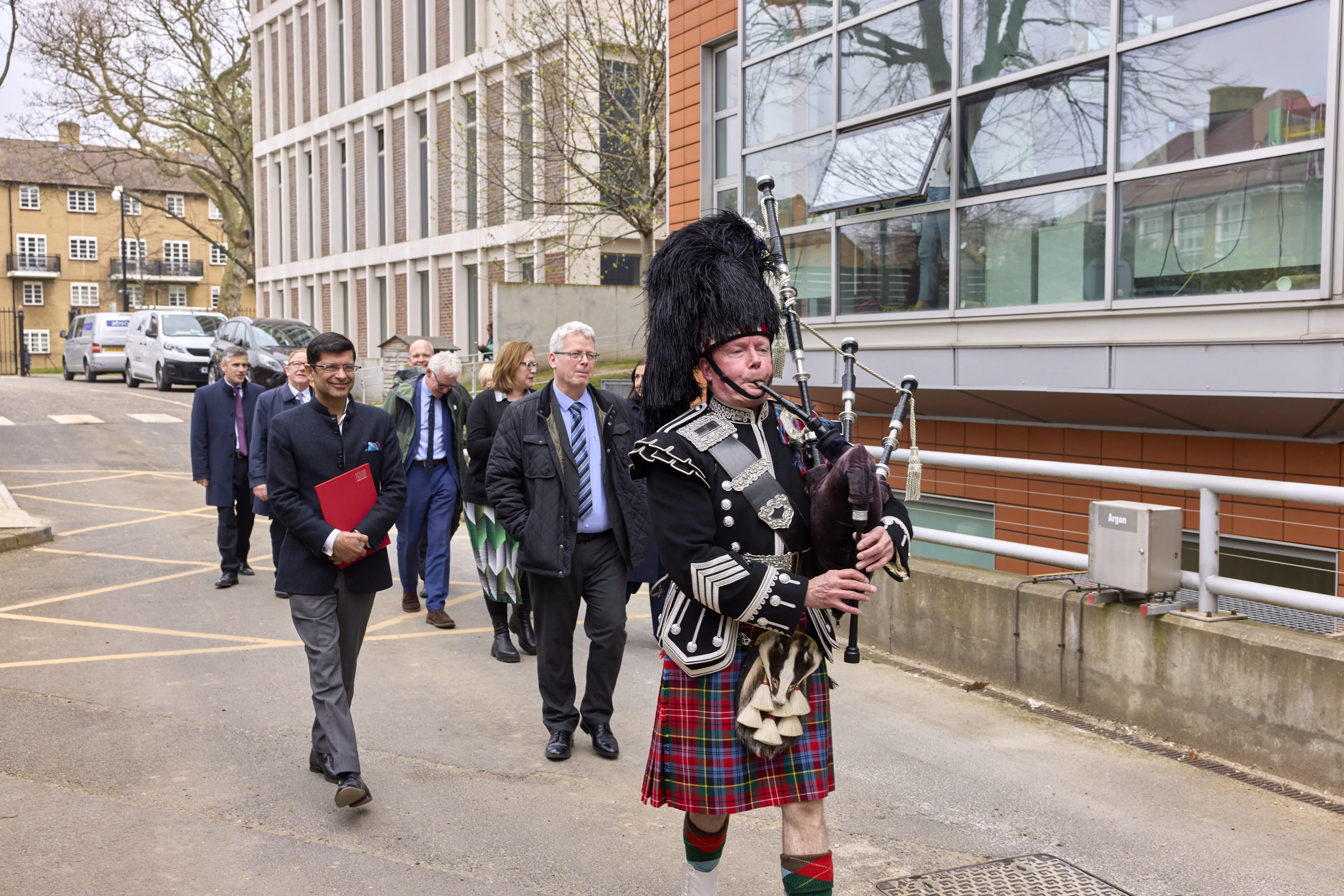 The guests were lead to the ceremony by a piper to honour McAlpine's Scottish heritage.