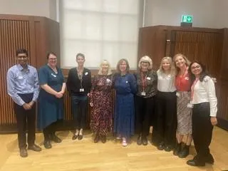A group of people stood in a line