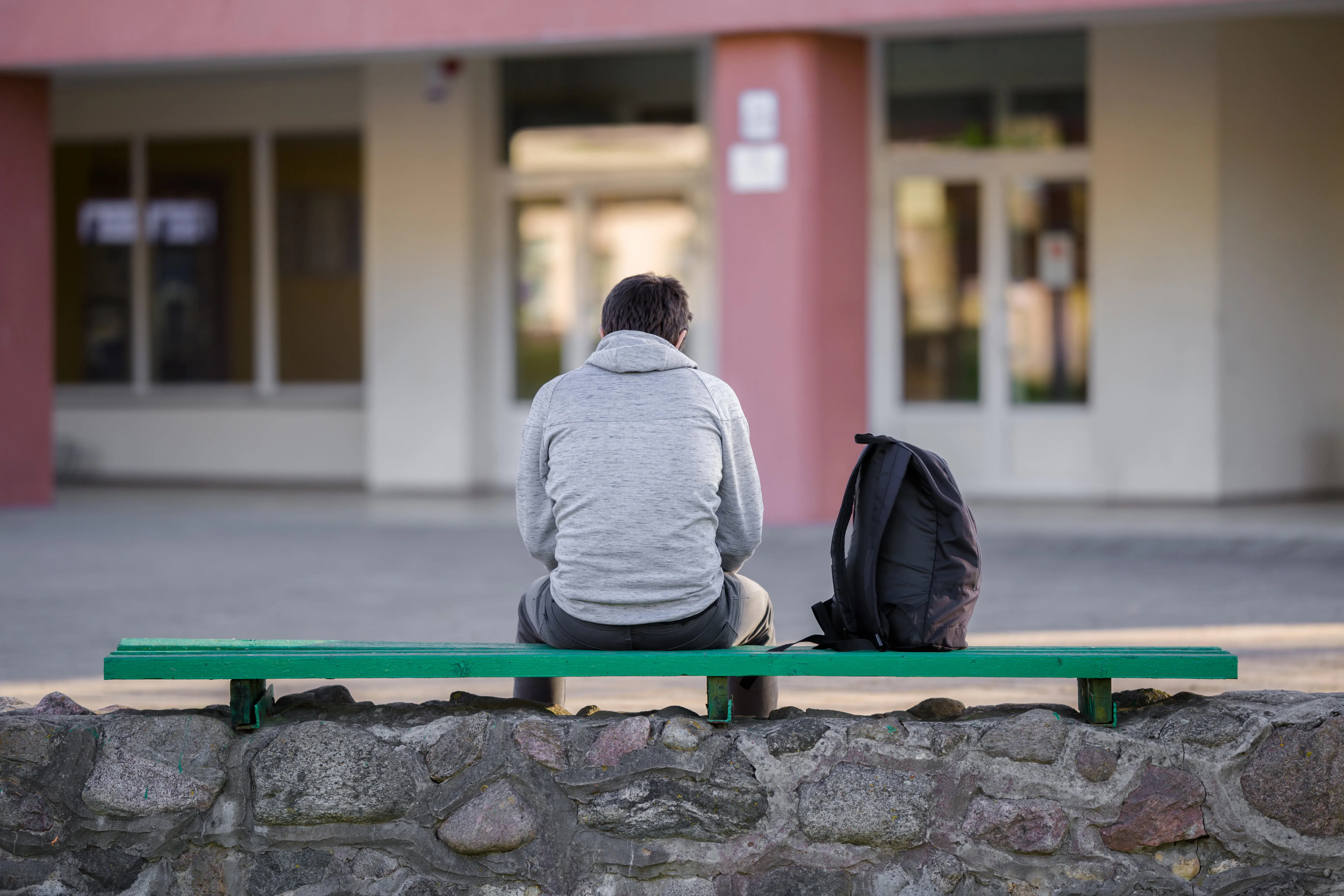 Teenager sitting