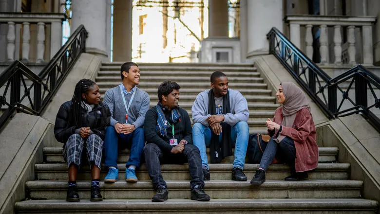 King's students sitting on steps