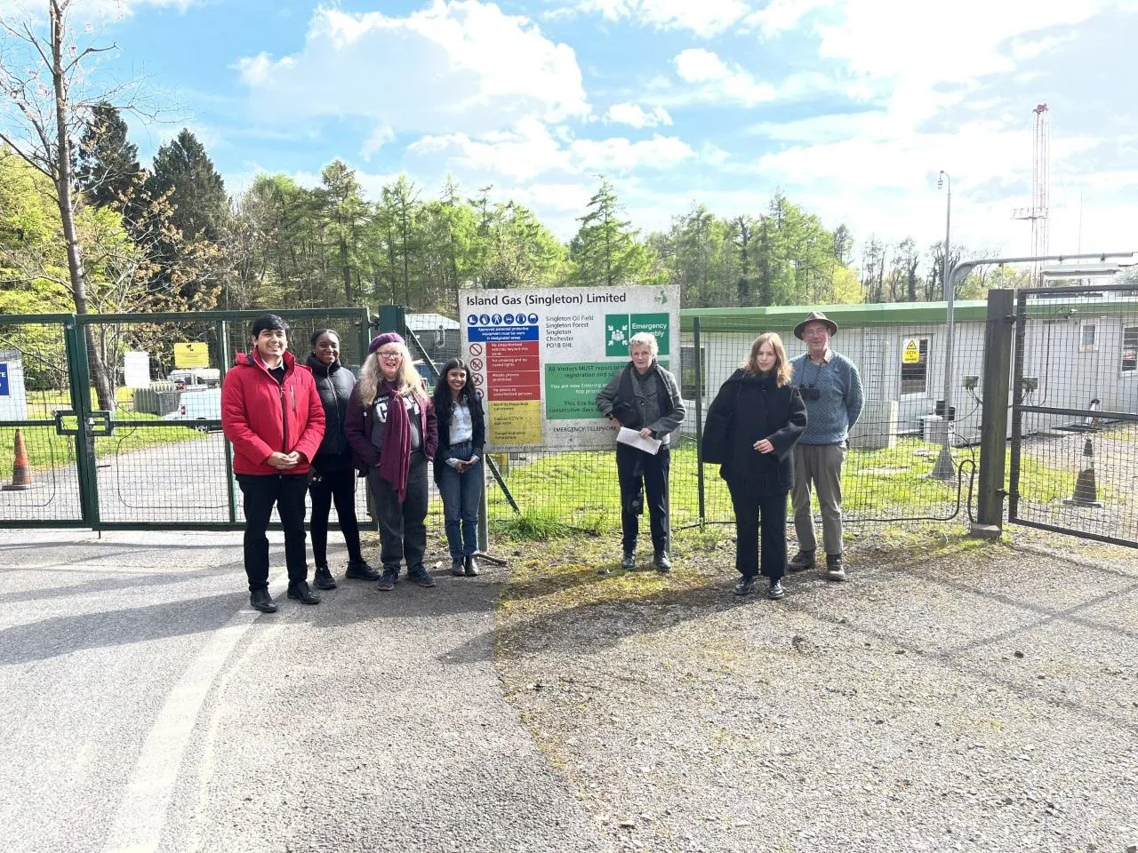 A group of people standing in front of Singleton