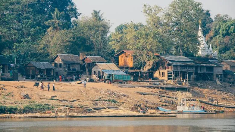 A village located by a river which could potentially be affected by climate change