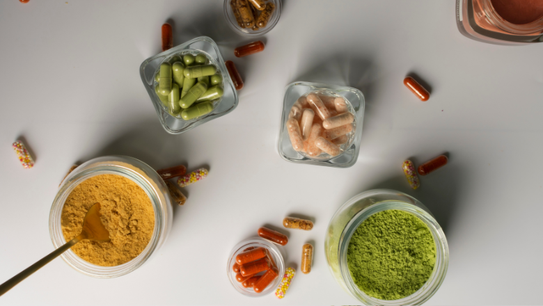brightly coloured powders and pills in pots