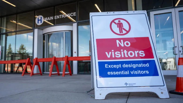 A no visitor sign at a hospital